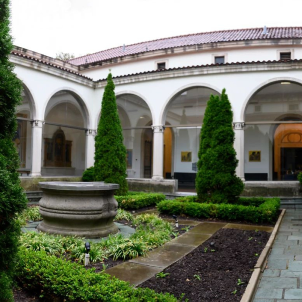 View of cloisters from courtyard garden