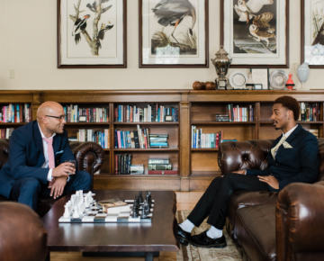 Men Sitting in Library